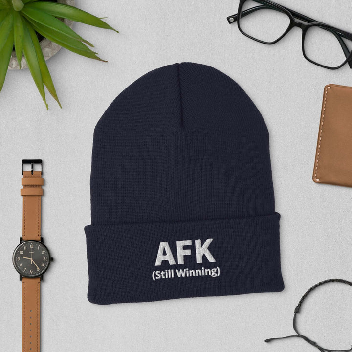 AFK cuffed beanie displayed with accessories, featuring &