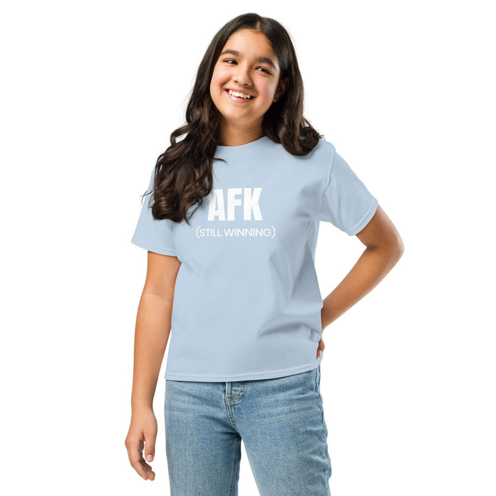 AFK Youth classic tee in light blue on girl, showcasing its stylish design and comfortable fit.