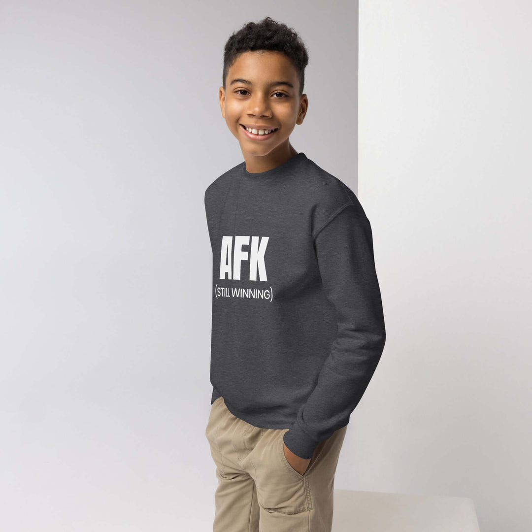 AFK Youth crewneck sweatshirt worn by a young boy, showcasing a cozy and stylish design for casual adventures.