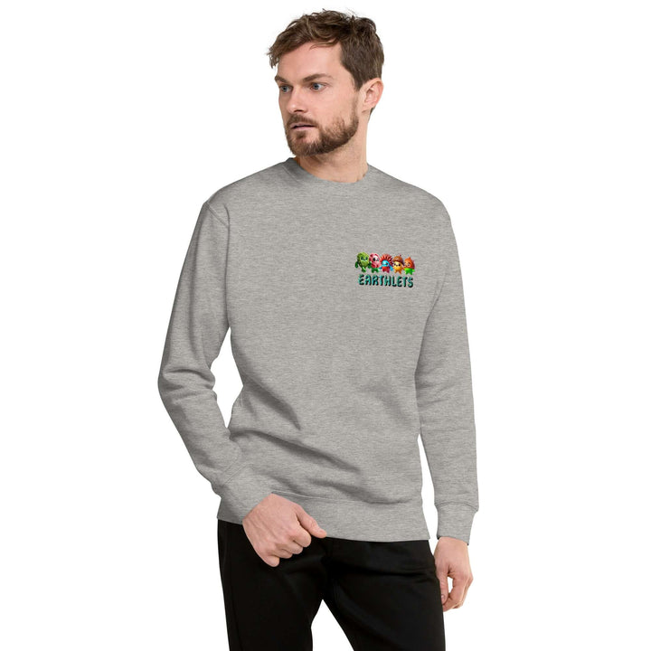 Man wearing Earthlets unisex premium sweatshirt in gray, featuring colorful logo on chest, showcasing modern streetwear style.