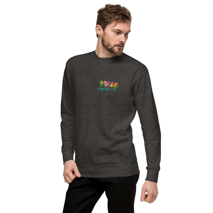 Earthlets Unisex Premium Sweatshirt displayed on a model wearing a charcoal sweatshirt with vibrant colors.