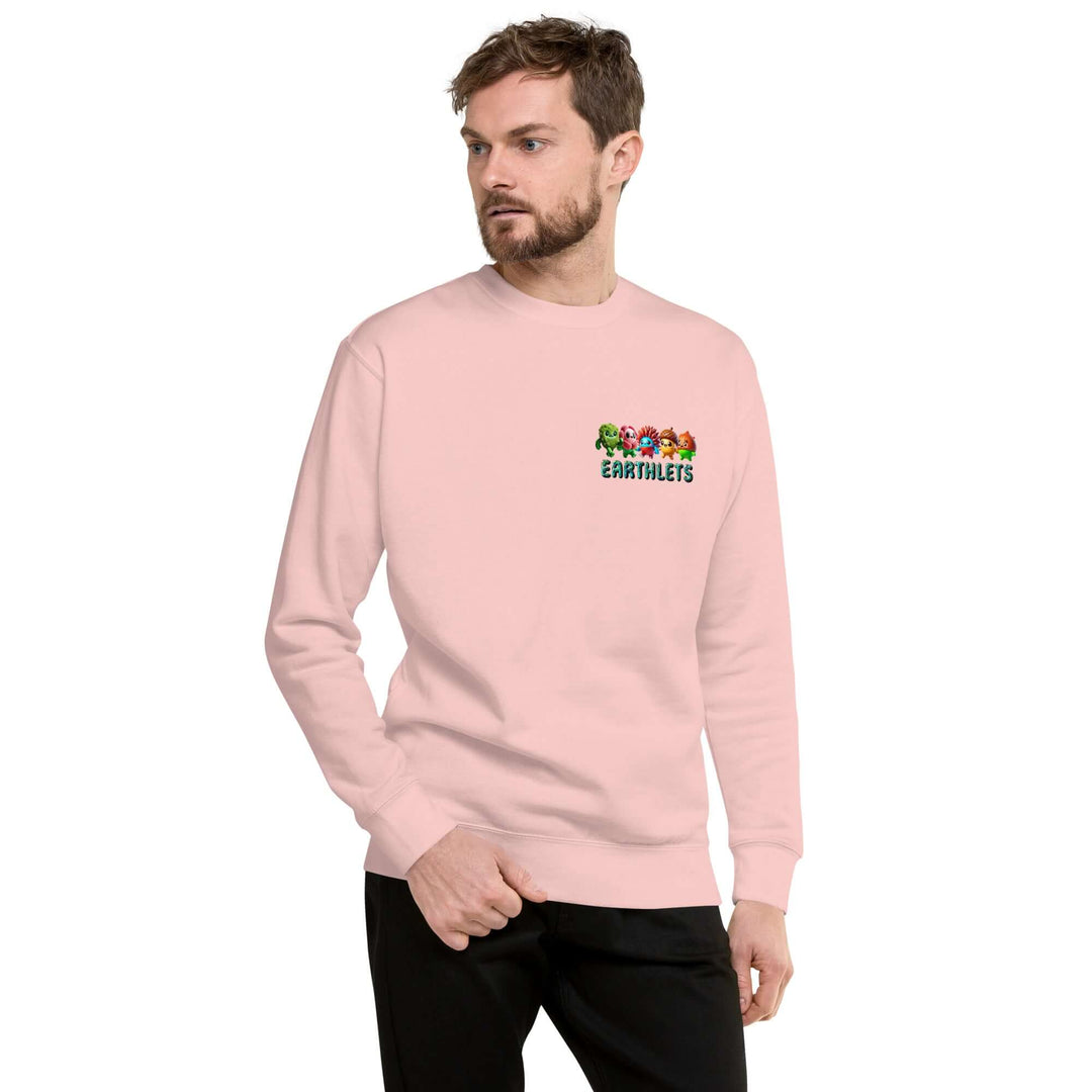 Man in pink Earthlets unisex premium sweatshirt, showcasing its comfortable style and soft fleece interior.