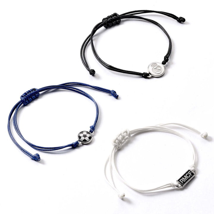 Real Madrid friendship bracelet set featuring adjustable black, blue, and white cords with football charms.
