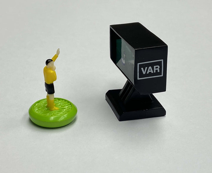 Subbuteo Referee Virtual Assistant Referee VAR Set featuring a referee figure and VAR monitor
