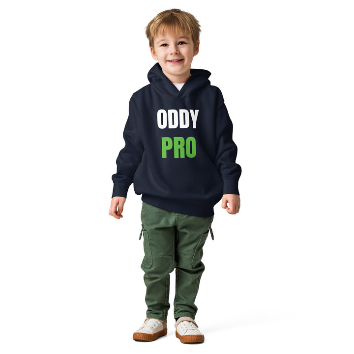 Toddler wearing Oddy Pro Toddler fleece pullover hoodie in navy with green lettering.